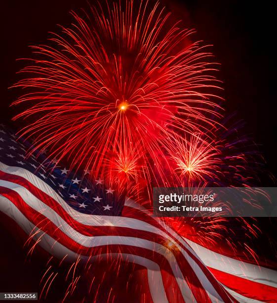 american flag and fireworks - american flag fireworks stock pictures, royalty-free photos & images