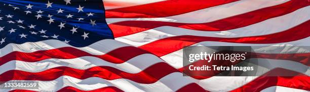 american flag in wind - american flag jpg stock pictures, royalty-free photos & images