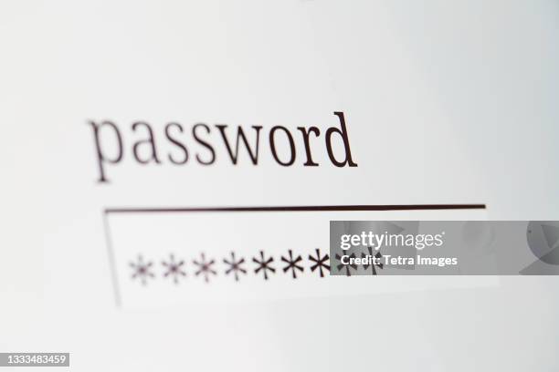 close-up of password on computer screen - password stock-fotos und bilder