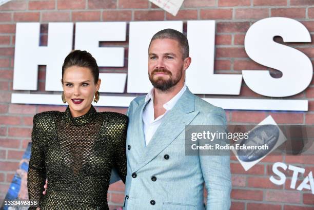 Cassandra Jean and Stephen Amell attend the STARZ premiere of new series "Heels" on August 10, 2021 in Los Angeles, California.