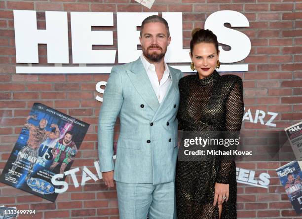 Stephen Amell and Cassandra Jean attend the premiere of the new STARZ series "Heels" on August 10, 2021 in Los Angeles, California.