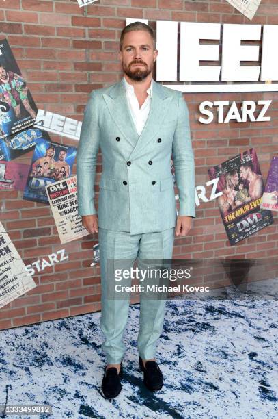 Stephen Amell attends the premiere of the new STARZ series "Heels" on August 10, 2021 in Los Angeles, California.