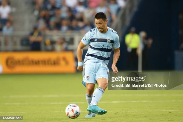 Roger Espinoza Sporting KC with the ball during a game between FC Dallas and Sporting Kansas City at Children's Mercy Park on July 31, 2021 in Kansas...