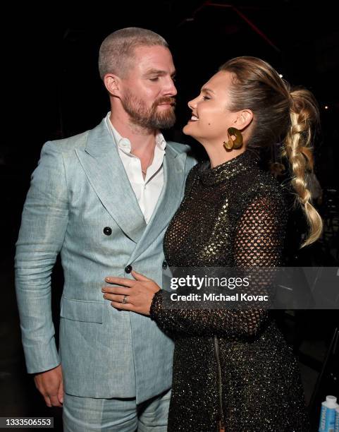 Stephen Amell and Cassandra Jean attend the after party for the premiere of the new STARZ series "Heels" on August 10, 2021 in Los Angeles,...