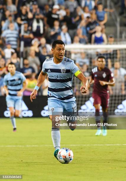 Roger Espinoza of Sporting KC dribbles upfield during a game between Colorado Rapids and Sporting Kansas City at Children's Mercy Park on June 23,...