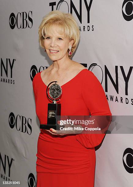 Daryl Roth poses with the award for Best Revival of a Play in the press room during the 65th Annual Tony Awards at the The Jewish Community Center in...