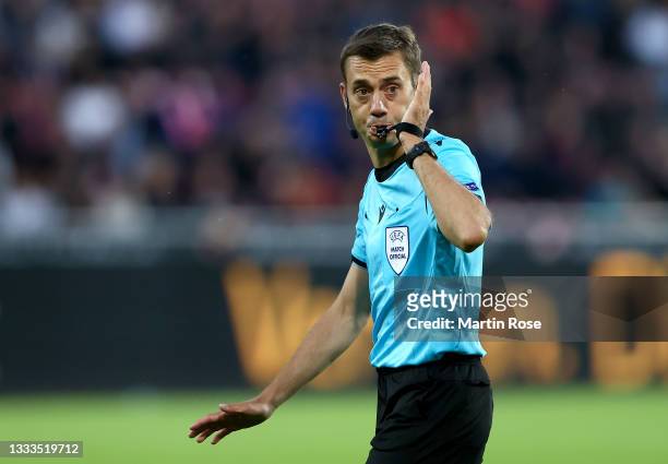 Referee Clément Turpin blows the whistle during the UEFA Champions League third qualifying round second leg between FC Midtjylland and PSV Eindhoven...