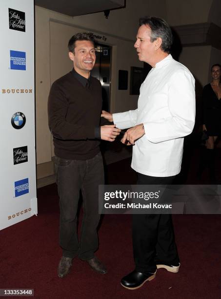 Radio personality Ryan Seacrest is greeted by chef Thomas Keller at the grand opening party at Bouchon on November 16, 2009 in Beverly Hills,...