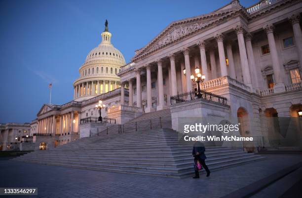 Sen. Mark Kelly departs the U.S. Capitol at dawn after an overnight session of the U.S. Senate on August 11, 2021 in Washington, DC. The Senate voted...