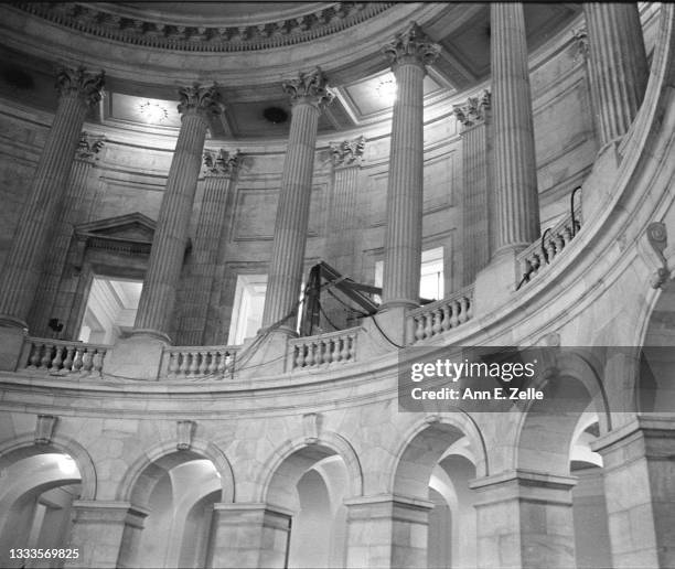 View, looking up, at the rotunda of the Russell Senate Office Building, Washington DC, October 3, 1973. The visible wiring was being used for the...