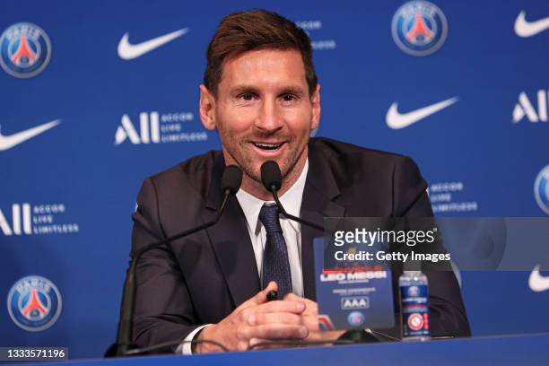Lionel Messi answers journalists during the press conference of Paris Saint-Germain at Parc des Princes on August 11, 2021 in Paris, France.