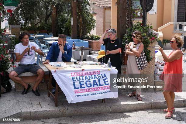 The Italian politician and activist Marco Cappato together with the Mayor of Arzachena Roberto Ragnedda and other activists while speaking to those...