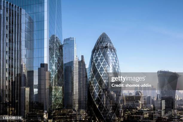 elevated view of modern london skyscrapers - multiple exposure - isle of dogs london stock-fotos und bilder