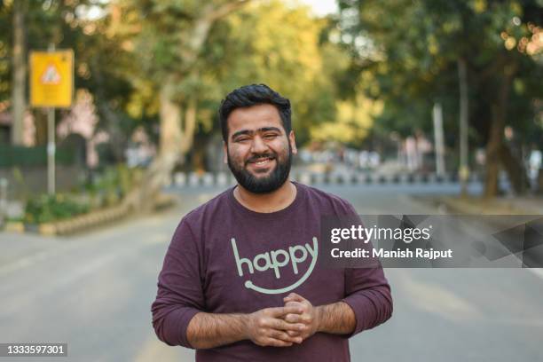 a portrait of young man - indian man stock pictures, royalty-free photos & images