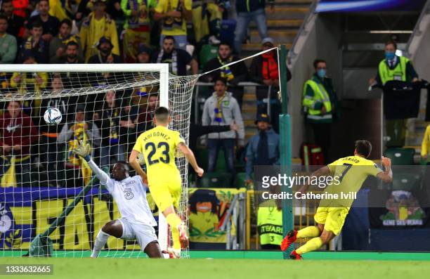 Gerard Moreno of Villarreal scores their team's first goal past Edouard Mendy of Chelsea during the UEFA Super Cup 2021 match between Chelsea FC and...