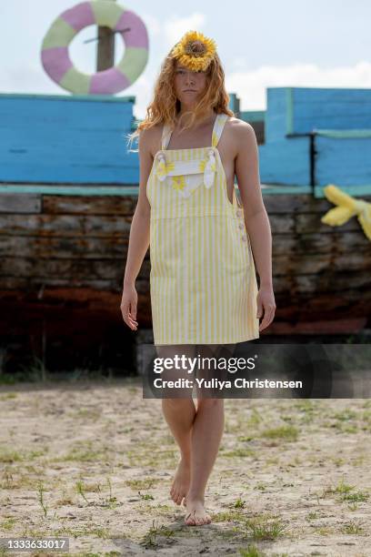 Model walks the runway at the Helmstedt show during the Copenhagen Fashion Week Spring/Summer 2022 on August 11, 2021 in Copenhagen, Denmark.