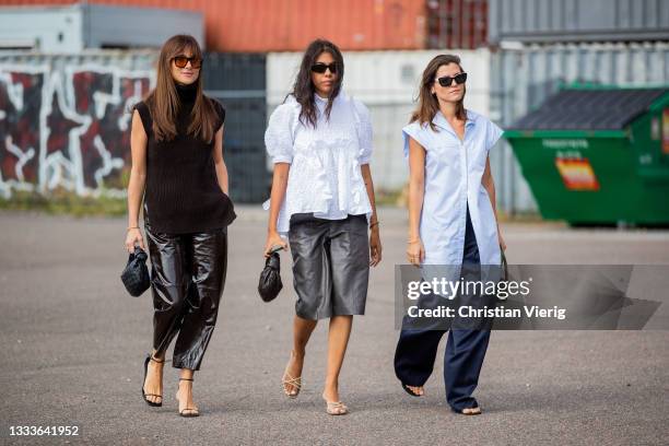 Lena Lademann, Storm Westphal and Liberta Haxhikadriu seen outside Samsøe Samsøe on August 11, 2021 in Copenhagen, Denmark.