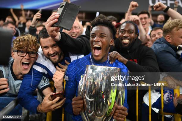 Callum Hudson-Odoi of Chelsea celebrates with the UEFA Super Cup Trophy following victory in the UEFA Super Cup 2021 match between Chelsea FC and...