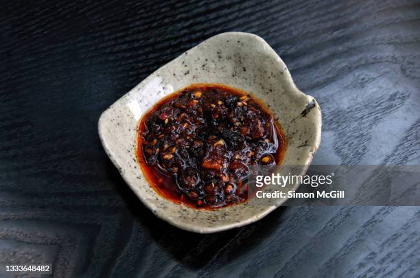 salsa macha in a handmade pottery bowl - sauce tex mex photos et images de collection