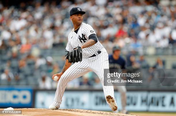 Luis Gil of the New York Yankees in action against the Seattle Mariners at Yankee Stadium on August 08, 2021 in New York City. The Mariners defeated...