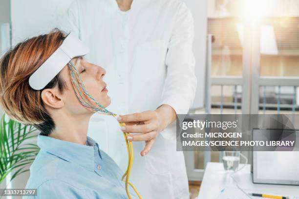 biofeedback electroencephalograph training - eeg stock pictures, royalty-free photos & images