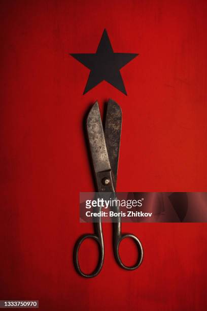 old scissors and black paper star. - cult stock pictures, royalty-free photos & images