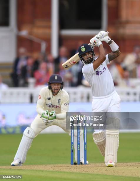 India batsman K L Rahul hits a ball from Moeen Ali for 6 runs watched by Jos Buttler during day one of the Second Test Match between England and...