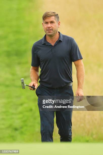 Robert Rock of England walks onto the seventeenth green during the First Round of the Cazoo Classic at the London Golf Club on August 12, 2021 in...