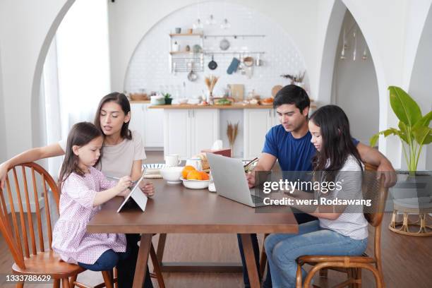 parents do homeschooling giving kids practice time learning - parental control stock pictures, royalty-free photos & images