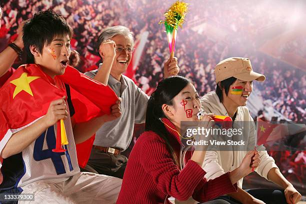 crowd cheering in stadium - asian cheerleaders stock-fotos und bilder