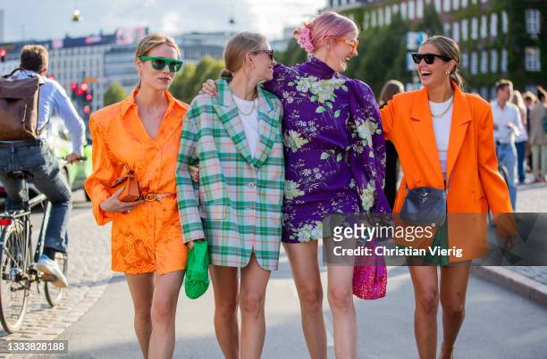 Annabel Rosendahl, Tine Andrea wearing green checkered oversized blazer Darja Barannik wearing orange dress, blazer, purple dress seen outside Baum...