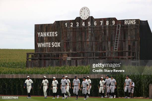 Members of the Chicago White Sox and the New York Yankees take the field prior to a game at the Field of Dreams on August 12, 2021 in Dyersville,...