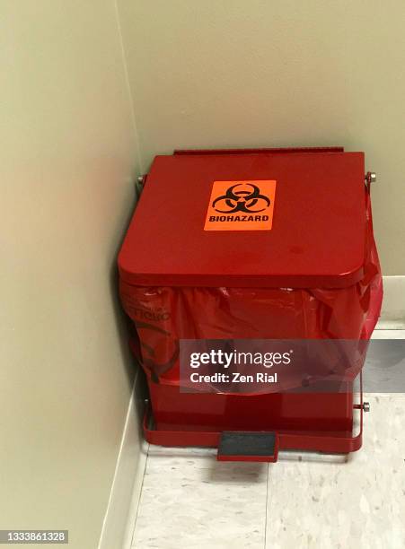 red biohazard medical waste garbage can and plastic bag - disposal container stock pictures, royalty-free photos & images