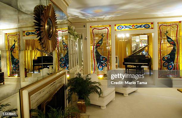 Elvis Presley's living room at Graceland is seen during Elvis Week on August 12, 2002 in Memphis, Tennessee. 75,000 fans are expected to attend the...