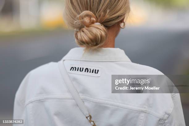 Scarlett Gartmann wearing Miu Miu beige jacket on August 07, 2021 in Dusseldorf, Germany.
