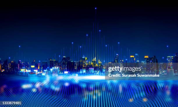 intelligent city networks and communication in the age of ai (wireless communication on the world) - man blue background fotografías e imágenes de stock