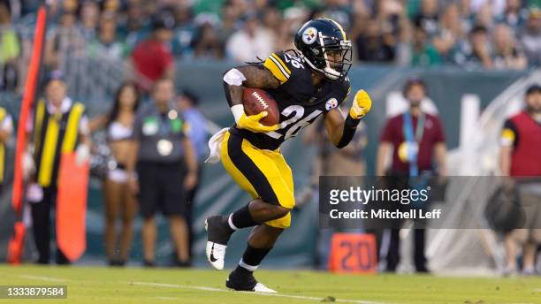 Anthony McFarland of the Pittsburgh Steelers runs with the ball against the Philadelphia Eagles during the preseason game at Lincoln Financial Field...