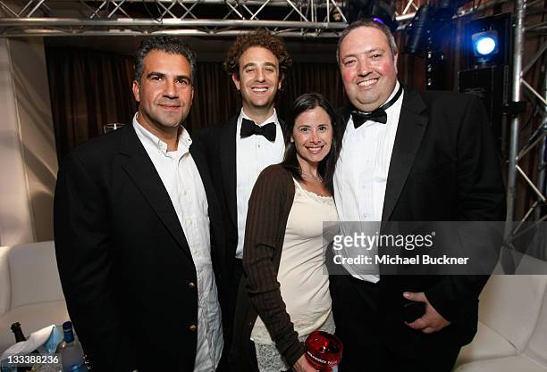 Exodus Film Group CEO John Eraklis, The Weinstein Company's Eric Robinson, Dana and Jean-Luc De Fanti attend the Relativity Media Cocktail Party at...