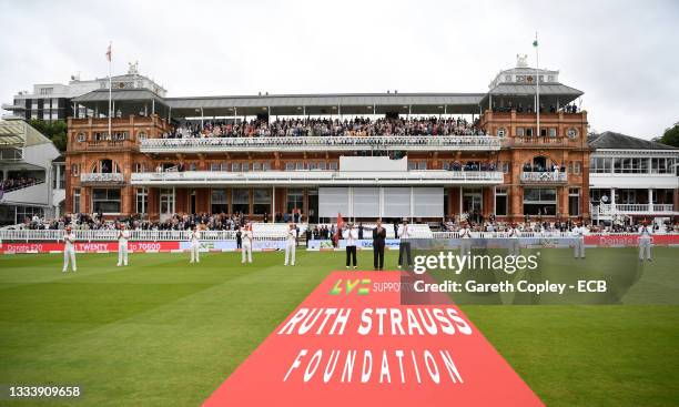 Players and officials stand for the Ruth Strauss Foundation ahead of day two of the Second LV= Insurance Test Match between England and India at...