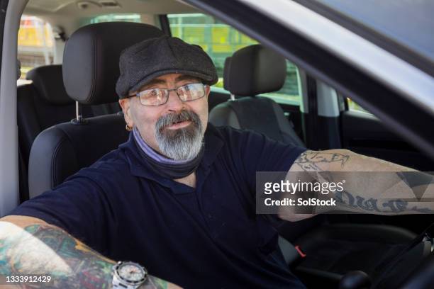 sitting car portrait - man goatee stock pictures, royalty-free photos & images