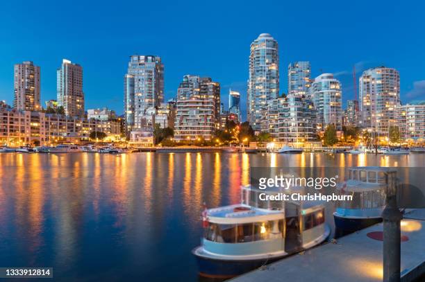 false creek at dusk, vancouver, canada - vancouver sunset stock pictures, royalty-free photos & images