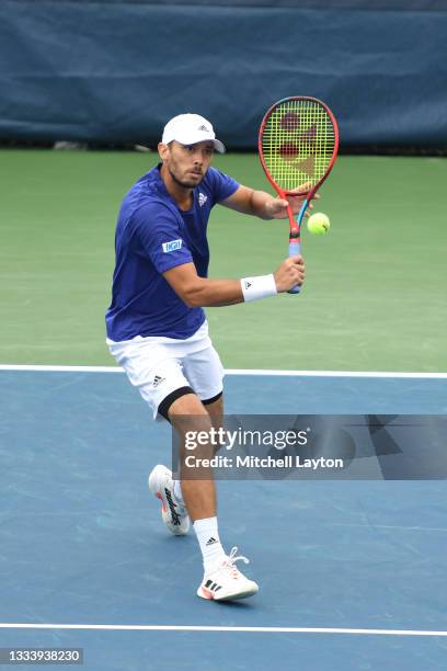 Ben McLachlan of Japan returns a shott during a match semi-final doubles match against Marcus Daniell of New Zealand and Marcelo Melo of Brazil on...