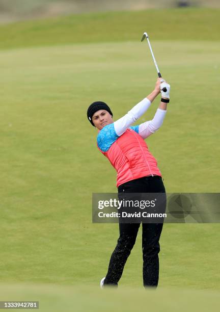 Carly Booth of Scotland plays her second shot on the 12th hole during the second round of the Trust Golf Scottish Women's Open at Dumbarnie Links on...