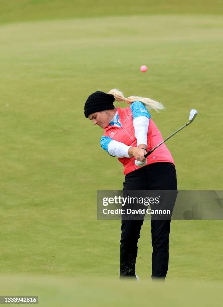 Carly Booth of Scotland plays her second shot on the 12th hole during the second round of the Trust Golf Scottish Women's Open at Dumbarnie Links on...