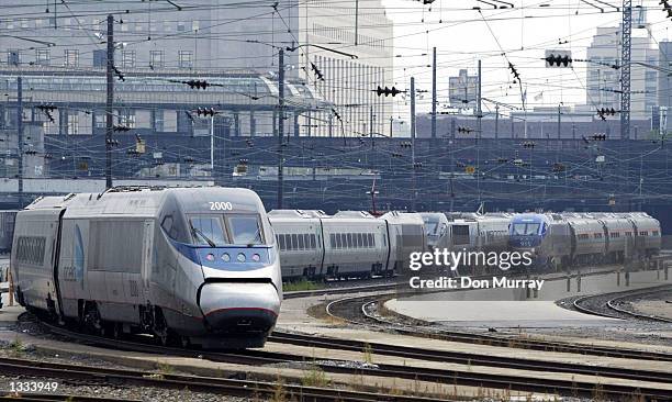 An Amtrak Acela Express train sits in the 30th Street Station August 13, 2002 in Philadelphia, Pennsylvania. Amtrak has suspended Acela Express train...