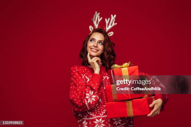 what is inside - christmas sweater stock pictures, royalty-free photos & images