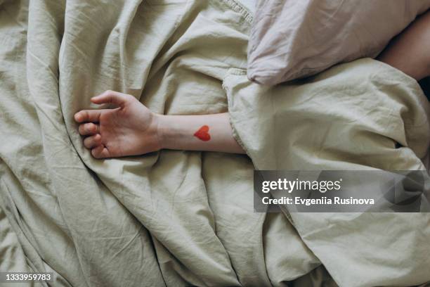 sleeping red-haired girl - tiny hands stock pictures, royalty-free photos & images