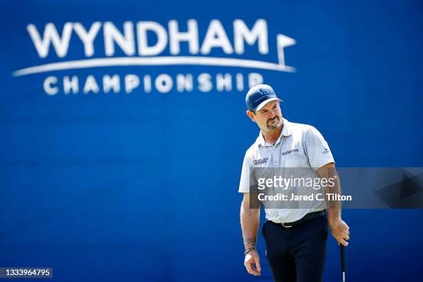 Rory Sabbatini of Slovakia looks on from the 18th green during the second round of the Wyndham Championship at Sedgefield Country Club on August 13,...