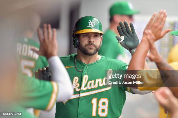 Mitch Moreland of the Oakland Athletics celebrates after hitting a solo homer during the fifth inning against the Cleveland Indians at Progressive...
