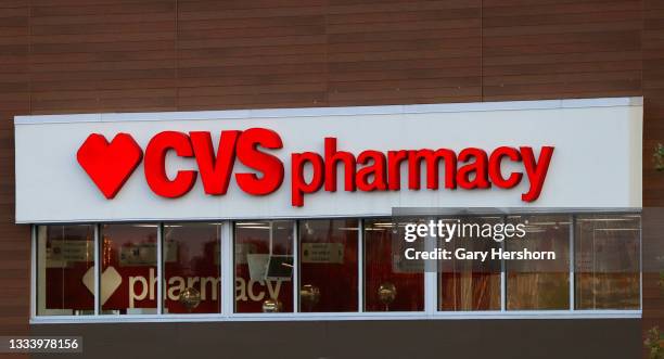 Pharmacy logo hangs on the side of a store on August 12, 2021 in Bayonne, New Jersey.